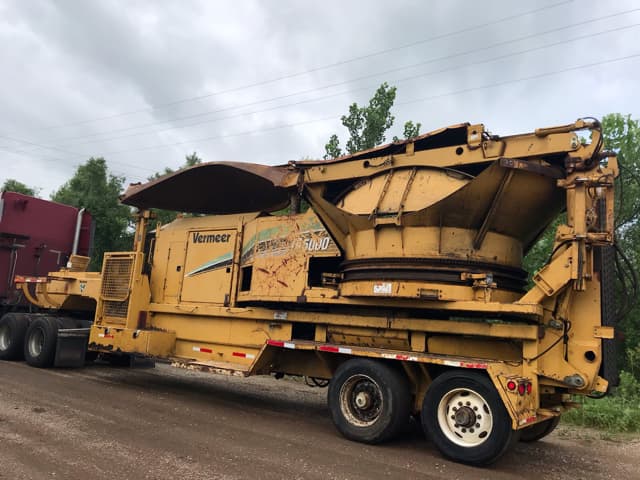 Vermeer TG5000 tub grinder on a transport trailer