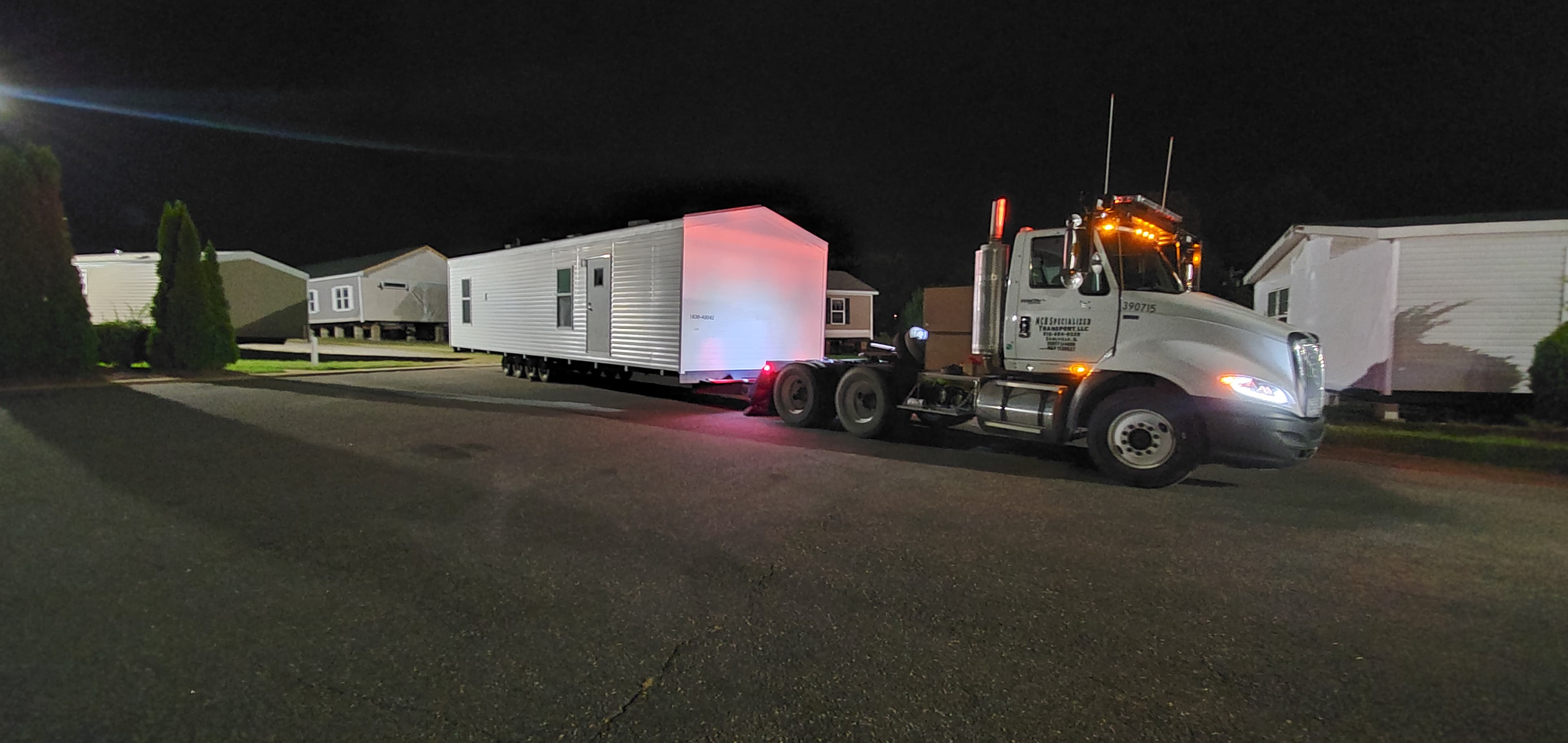 Tiny home transported on a heavy-haul trailer