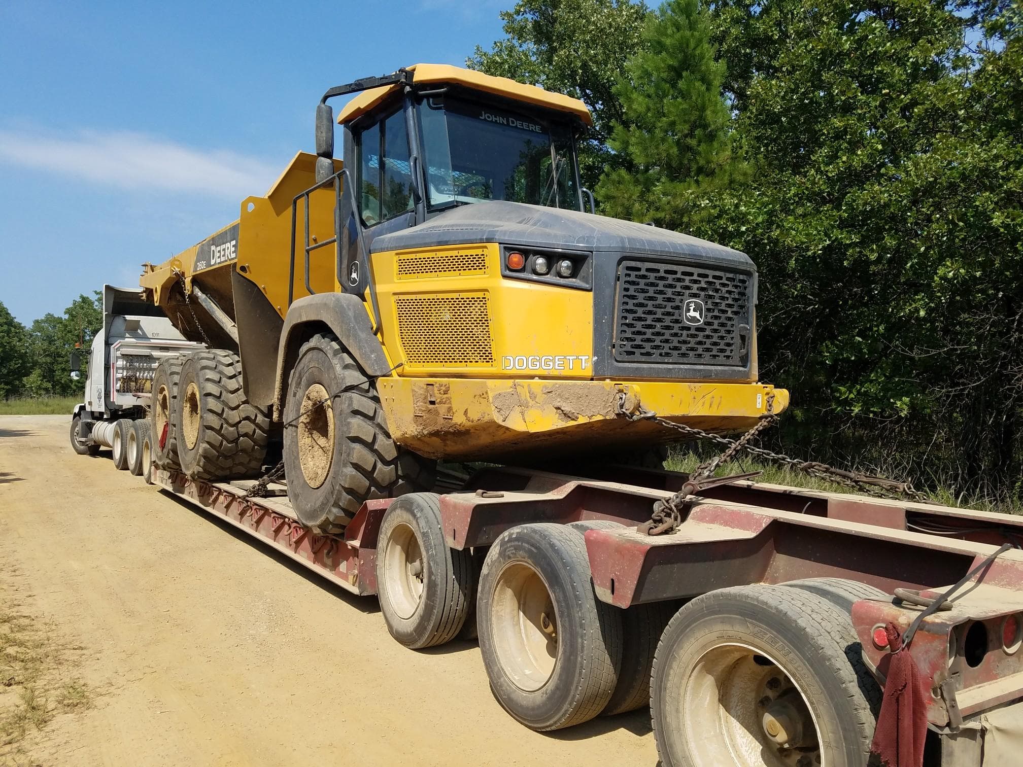 Articulated dump truck transport in San Antonio